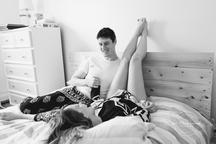 In-home lifestyle engagement session bedroom laying down pillow fight. Séance de fiançailles couple romantique à la maison à Montréal | Lisa-Marie Savard Photographie | Montréal, Québec | www.lisamariesavard.com