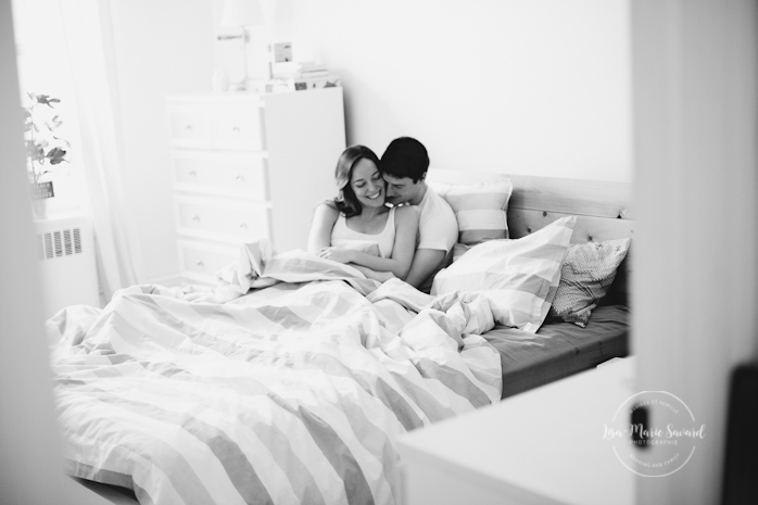 In-home lifestyle engagement session bedroom laying down pillow fight. Séance de fiançailles couple romantique à la maison à Montréal | Lisa-Marie Savard Photographie | Montréal, Québec | www.lisamariesavard.com