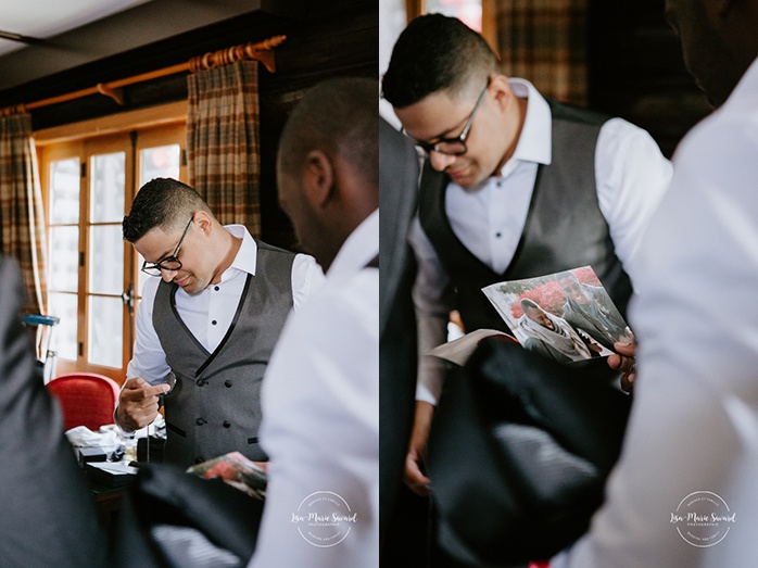 African American groom getting ready with groomsmen in hotel room. Mariage en Outaouais. Outaouais wedding. Ottawa photographer.