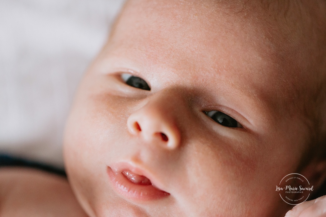 In-home lifestyle newborn session. Newborn photos in nursery. Macro photo of newborn's face. Photos de bébé à Montréal. Montreal North Shore newborn photoshoot.