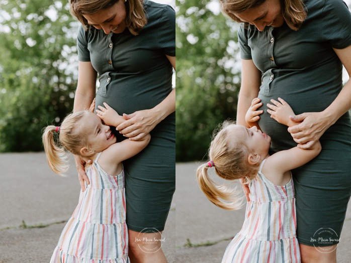 Big sister hugging belly. Toddler girl hugging pregnant belly. In-home family session. Maternity photos with toddler girl. Photographe de famille à Vaudreuil Dorion. Vaudreuil family photographer. Séance maternité à Vaudreuil Dorion.