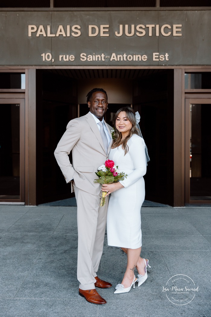 Montreal elopement wedding. Montreal courthouse elopement. Elopement à Montréal. Fugue amoureuse Montréal. Mariage au Palais de Justice de Montréal. Photographe de mariage à Montréal. Montreal wedding photographer. Biracial wedding photos. Mixed wedding photos. Black groom and Asian bride. 