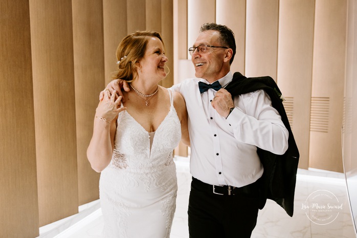 Wedding photos in dark hotel lobby. Older couple wedding photos. Middle aged couple wedding photos. Retired couple wedding photos. Mature couple wedding photos. Photographe de mariage à Laval. Laval wedding photographer.