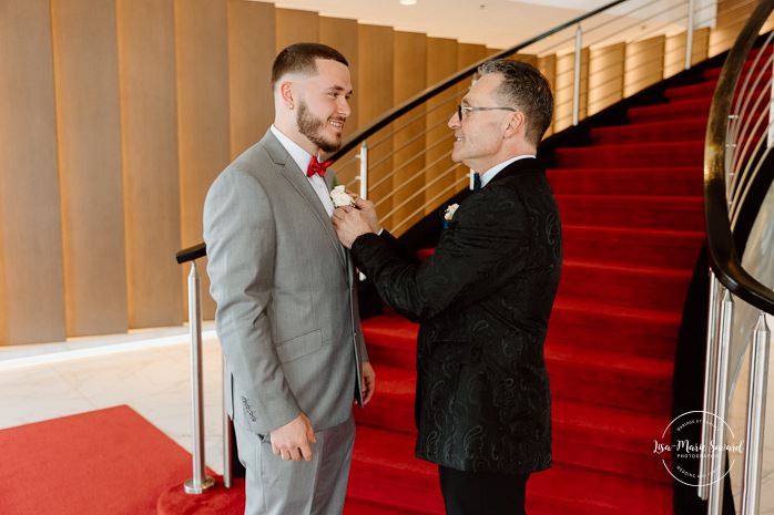 Groom getting ready with son. Mariage centre de congrès Palace Laval. Mariage à Laval. Palace convention centre wedding. Laval wedding photographer.