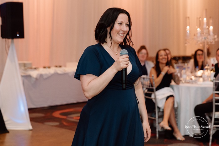 Wedding toast to the newlyweds. Wedding reception in ballroom. Mariage centre de congrès Palace Laval. Mariage à Laval. Palace convention centre wedding. Laval wedding photographer.