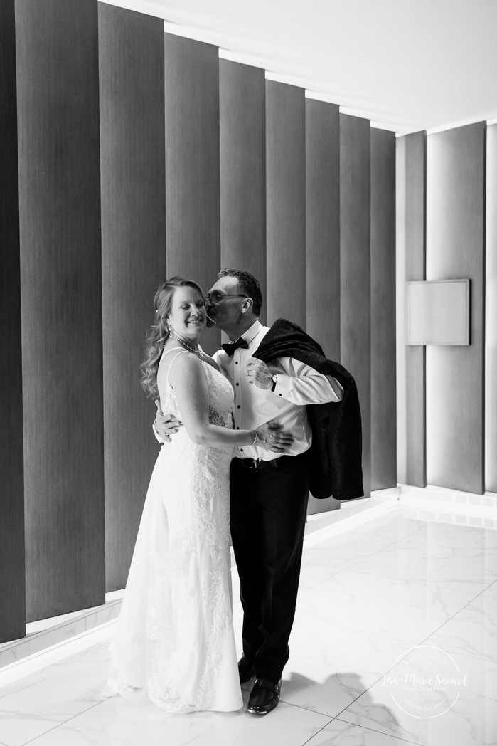 Wedding photos in dark hotel lobby. Older couple wedding photos. Middle aged couple wedding photos. Retired couple wedding photos. Mature couple wedding photos. Photographe de mariage à Laval. Laval wedding photographer.