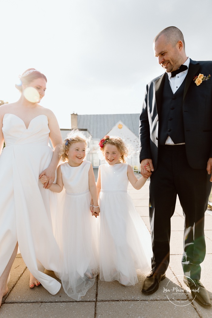 Wedding photos with children. Rooftop wedding photos. Cityscape wedding photos. Mariage à Montréal au Livart. Montreal wedding at Le Livart. Photographe de mariage à Montréal. Montreal wedding photographer.