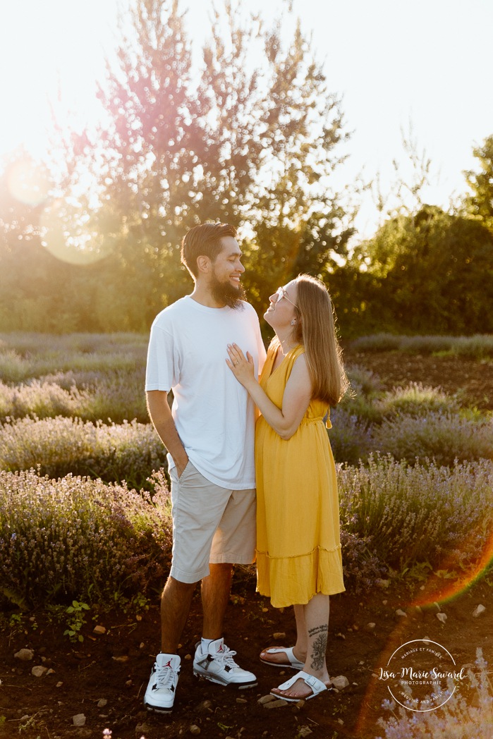 Lavender field engagement photos. Lavender field photo session. Golden hour engagement photos. Séance photo à la Maison Lavande. Maison Lavande photoshoot. Photos de fiançailles à Montréal. Montreal engagement photos.