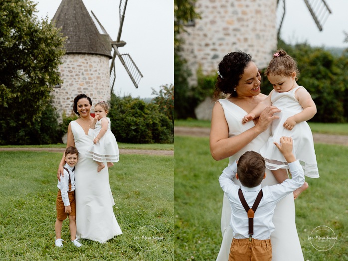 Wedding photos with children. Wedding family photos with kids. Wedding windmill photos. Mariage au Baluchon Éco-Villégiature. Auberge Le Baluchon. Photographe mariage Trois-Rivières.