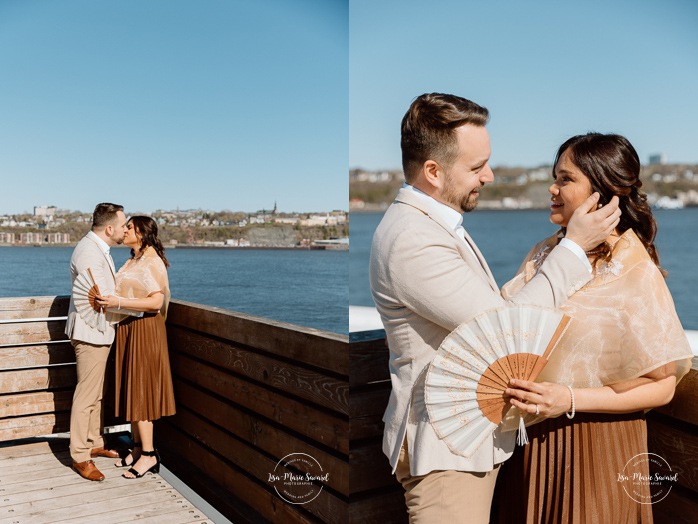 Urban engagement photos. Interracial couple photos. Séance fiançailles dans le Vieux-Québec. Photographe de mariage ville de Québec. Place des Canotiers. Quebec City photographer. Old Quebec engagement photos.