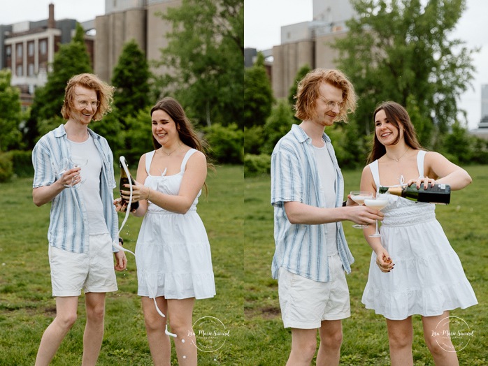 Champagne bottle engagement photos. Urban engagement photos. Séance photo de fiançailles à Montréal. Montreal engagement photos. Photographe de mariage à Montréal. Montreal wedding photographer. Séance photo Canal de Lachine. Lachine Canal photoshoot.