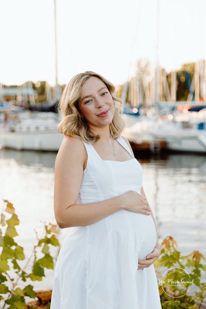 Sailboat maternity photos. Yacht club maternity photos. Marina maternity photos. Photographe à Pointe-Claire. Photos de maternité dans le West Island. Pointe-Claire photographer. West Island maternity photographer.