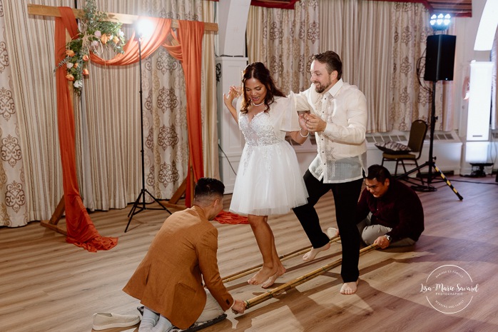 Traditional Filipino wedding dance. Multicultural wedding reception. Mixed wedding reception. Mariage au Manoir du lac Delage. Photographe de mariage Ville de Québec. Quebec City wedding photographer. Manoir du lac Delage wedding.