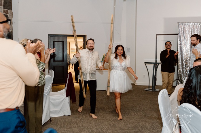 Traditional Filipino wedding dance. Multicultural wedding reception. Mixed wedding reception. Mariage au Manoir du lac Delage. Photographe de mariage Ville de Québec. Quebec City wedding photographer. Manoir du lac Delage wedding.