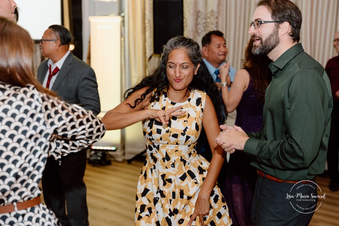 Wedding dancefloor photos. Fun wedding party photos. Multicultural wedding reception. Mixed wedding reception. Mariage au Manoir du lac Delage. Photographe de mariage Ville de Québec. Quebec City wedding photographer. Manoir du lac Delage wedding.