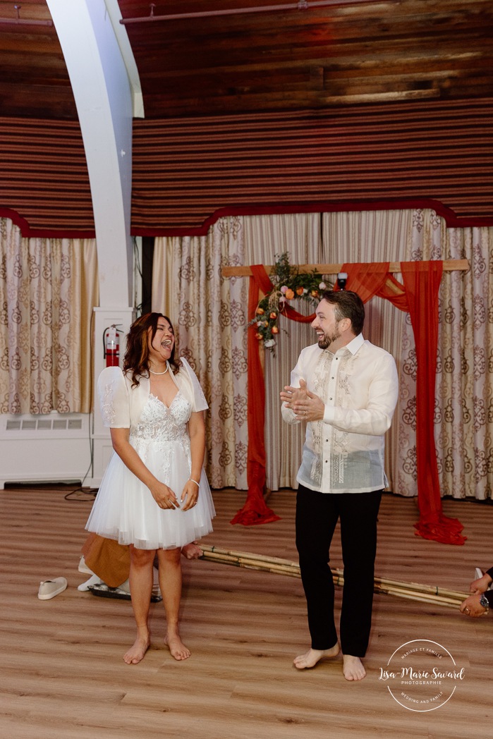Traditional Filipino wedding dance. Multicultural wedding reception. Mixed wedding reception. Mariage au Manoir du lac Delage. Photographe de mariage Ville de Québec. Quebec City wedding photographer. Manoir du lac Delage wedding.