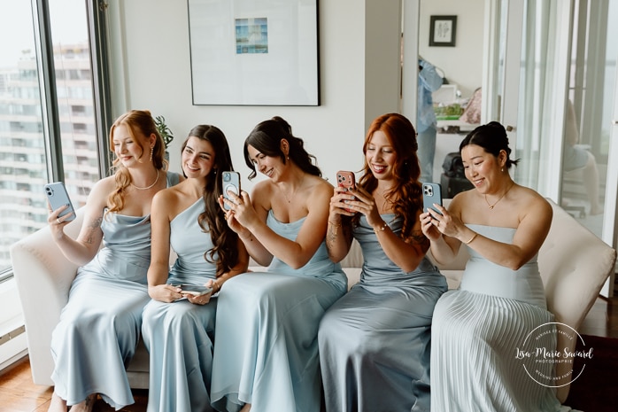 Bride getting ready with bridesmaids in condo. Mariage à l'Espace Canal à Montréal. L'Ambroisie et Espace Canal. Photographe de mariage à Montréal. Espace Canal wedding. Montreal wedding photographer.